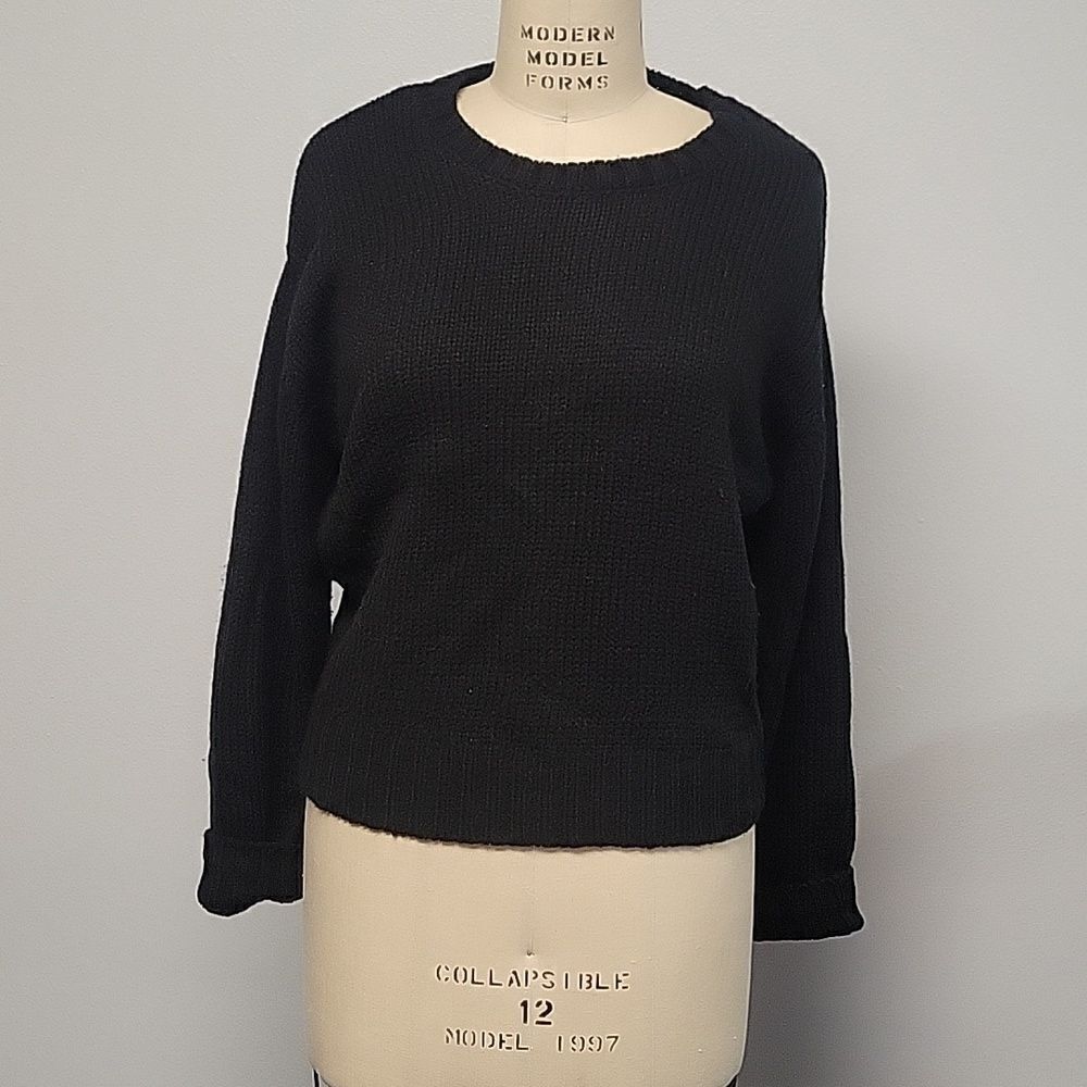 Premise size L long sleeve black sweater with twist in back and sleeves